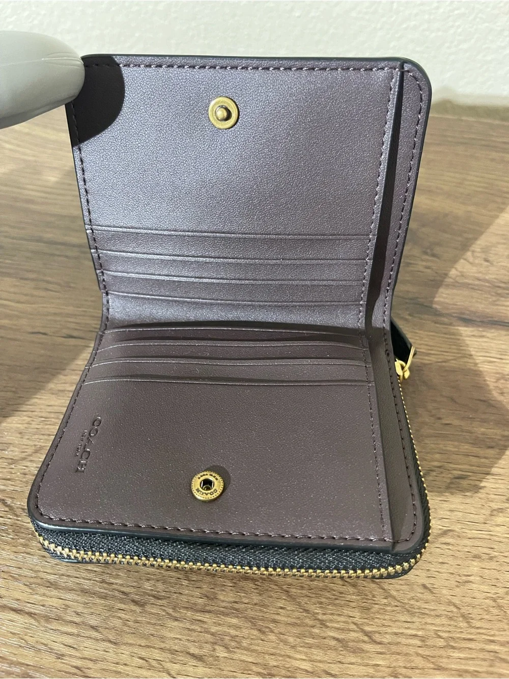 Coach Black Leather Zip-Around Wallet with Gold Hardware